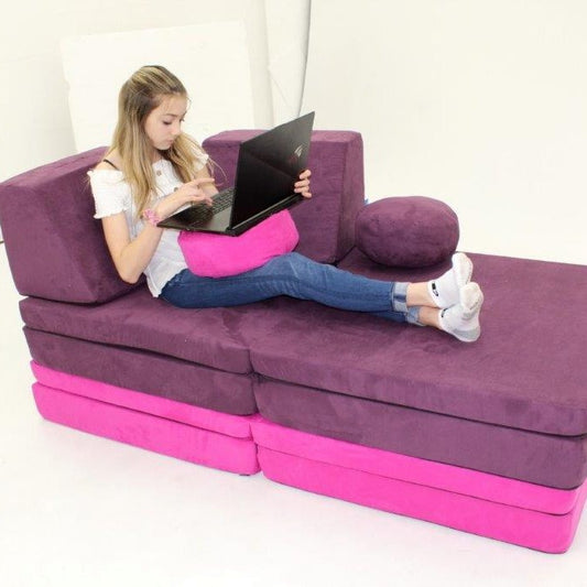 Kiddoz Couch, Young Girl on Laptop sitting on modular seating designed for children